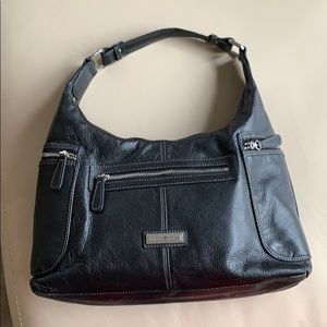 Black leather shoulder bag.